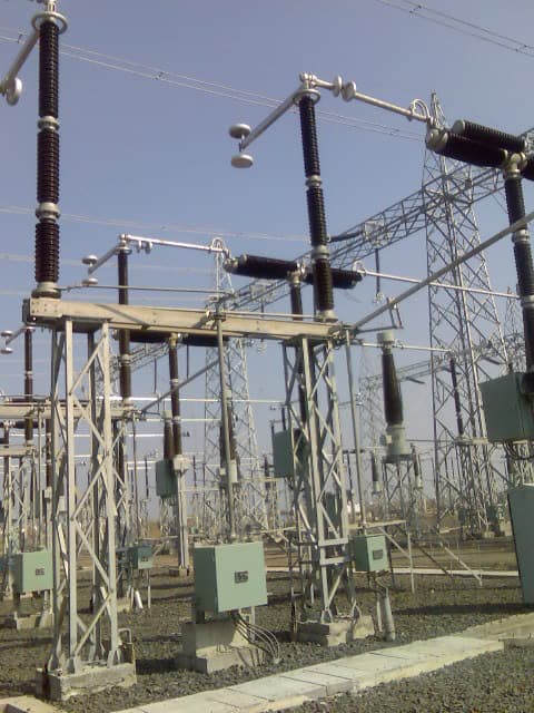 Critical 400kV switchyard equipment including high-voltage isolators and earth switches, installed for reliable power transmission and substation safety.