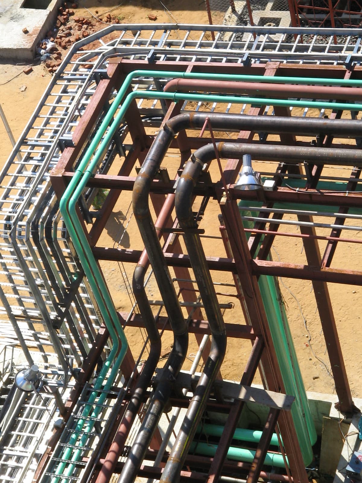 Strategic cable tray routing overview demonstrating efficient path planning to avoid obstructions and minimize cable lengths.