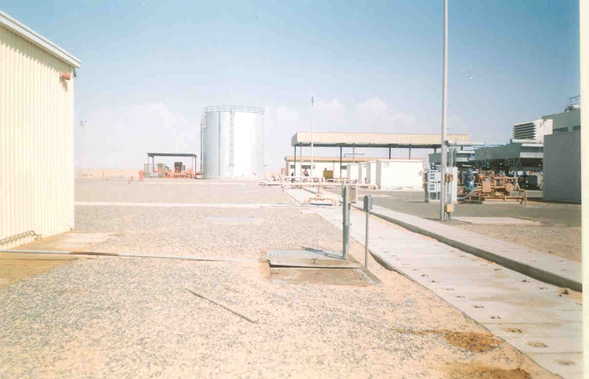 Combined emergency communication and fire safety station featuring call points and fire extinguishers.