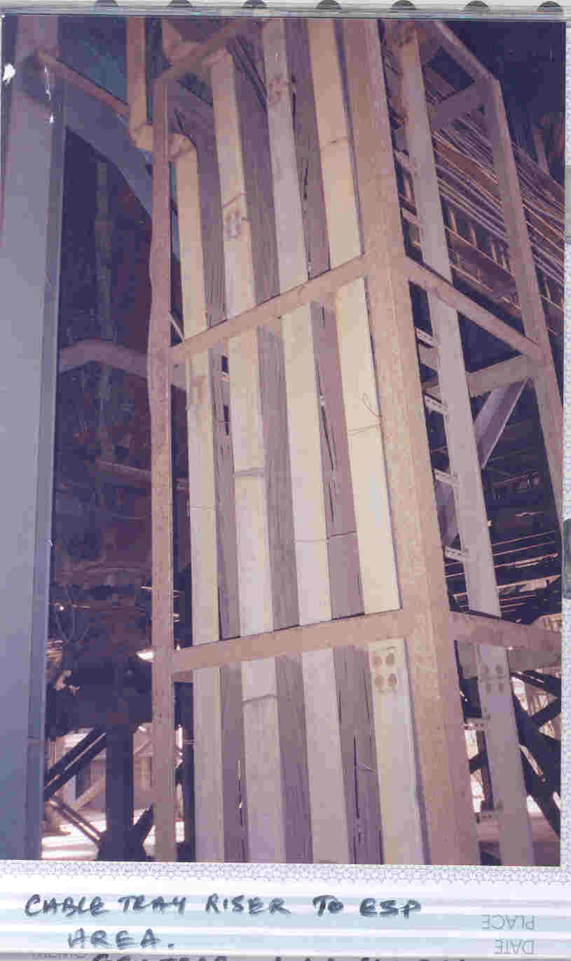 Electric Overhead Traveling (EOT) crane electrical installation showing the control panel and festoon cable wiring.