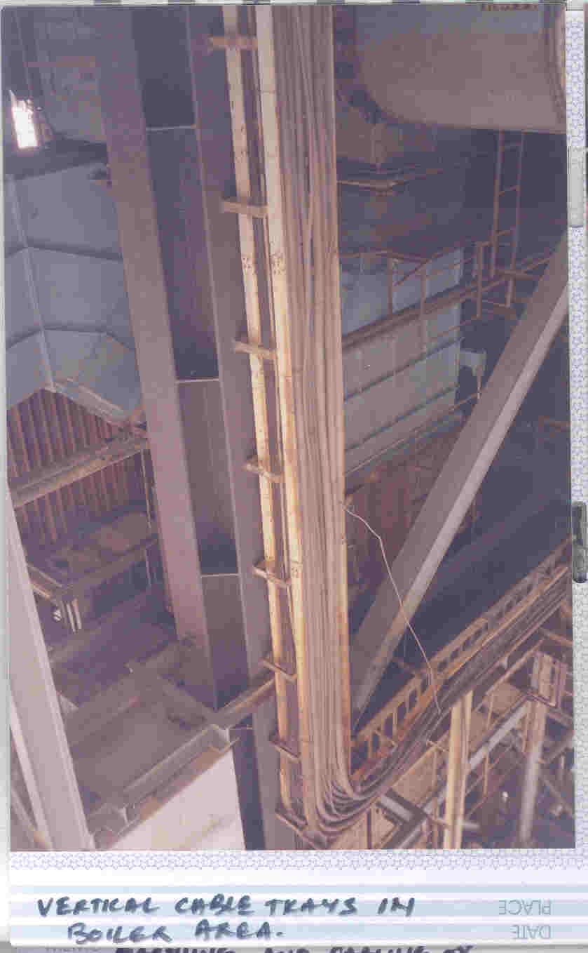 Hybrid overhead support system carrying both cable trays and HVAC ducts, coordinately routed to avoid clashes.