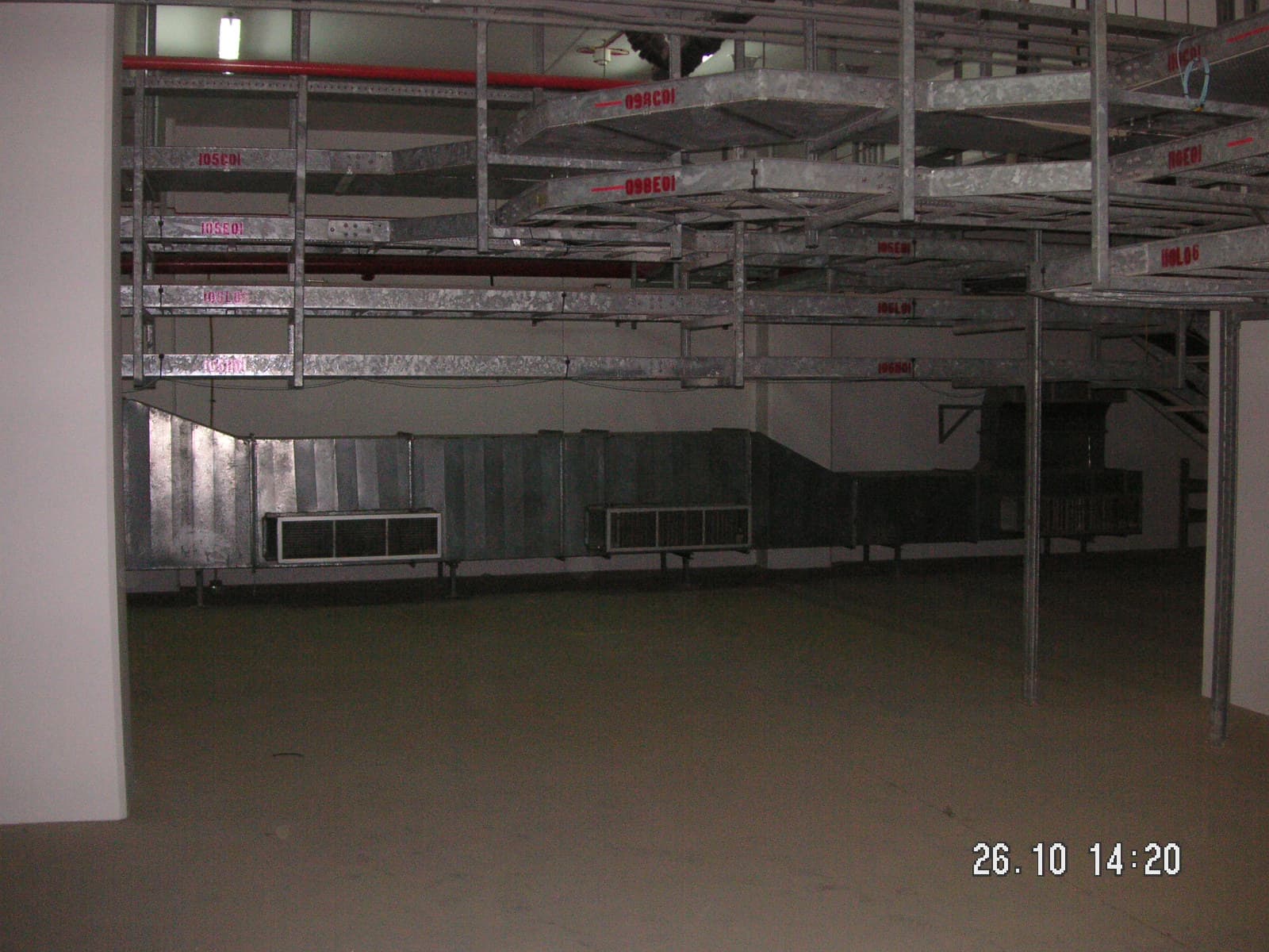 Wide-angle view of a power substation yard illustrating the layout of gantries, breakers, and transformers.