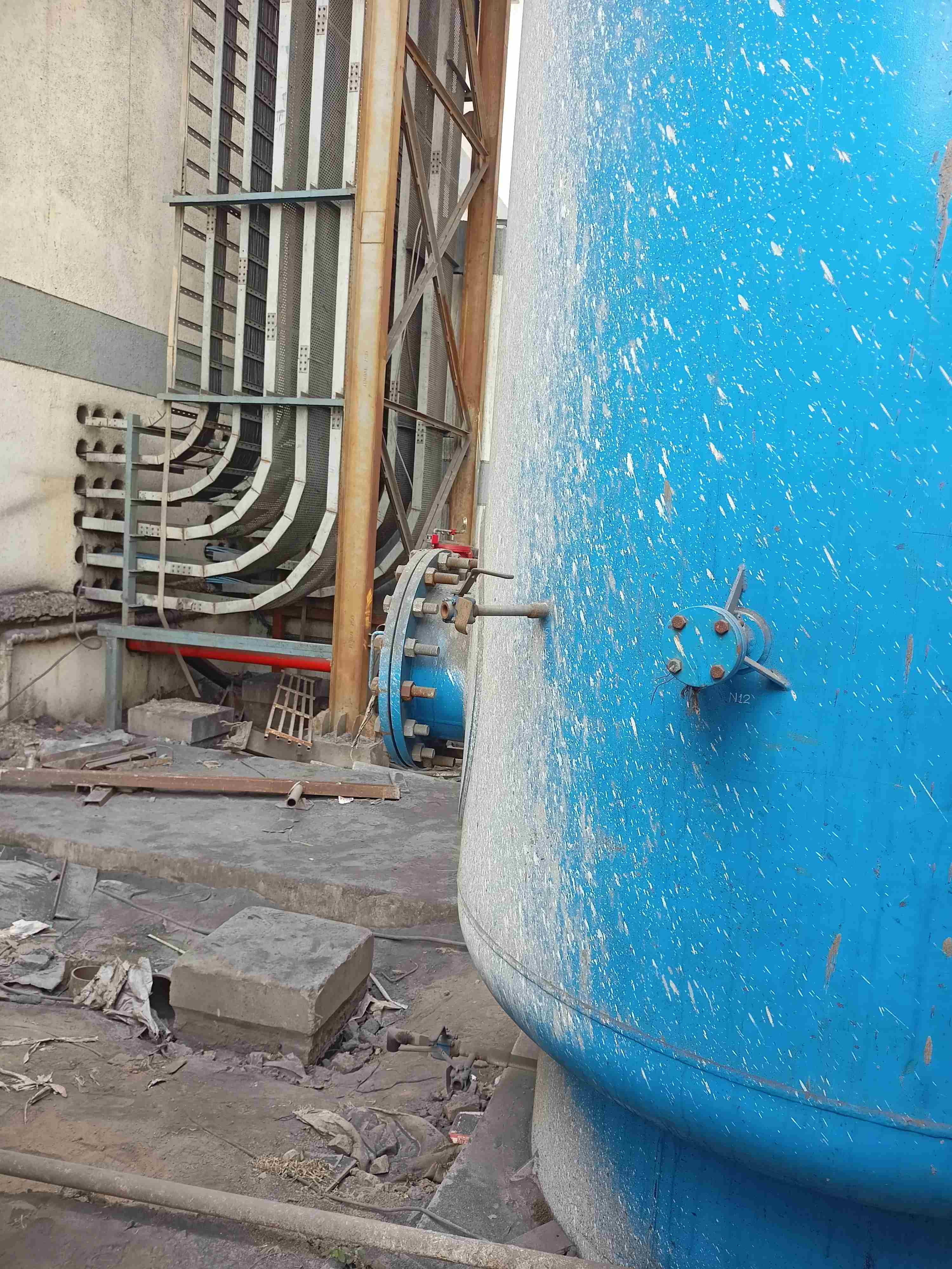 Secondary view of an underground cable duct bank emphasizing the concrete encasement for mechanical protection of conduits.