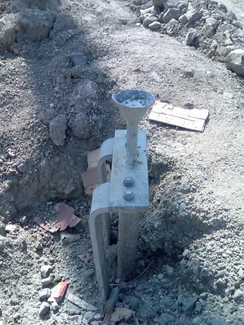 Installation of Earth Pipe 1, a key component of the grounding system designed to dissipate fault currents safely into the ground.