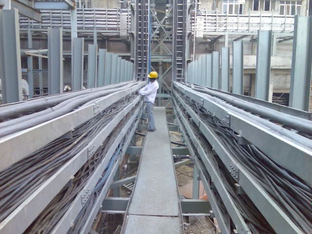 Field-mounted emergency telephone installation for rapid communication during safety incidents in remote industrial areas.