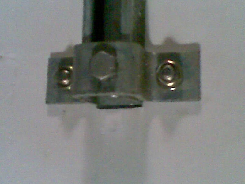 Galvanized Iron (GI) pipe clamp - Durable Galvanized Iron (GI) pipe clamp used for securely fixing conduits or pip