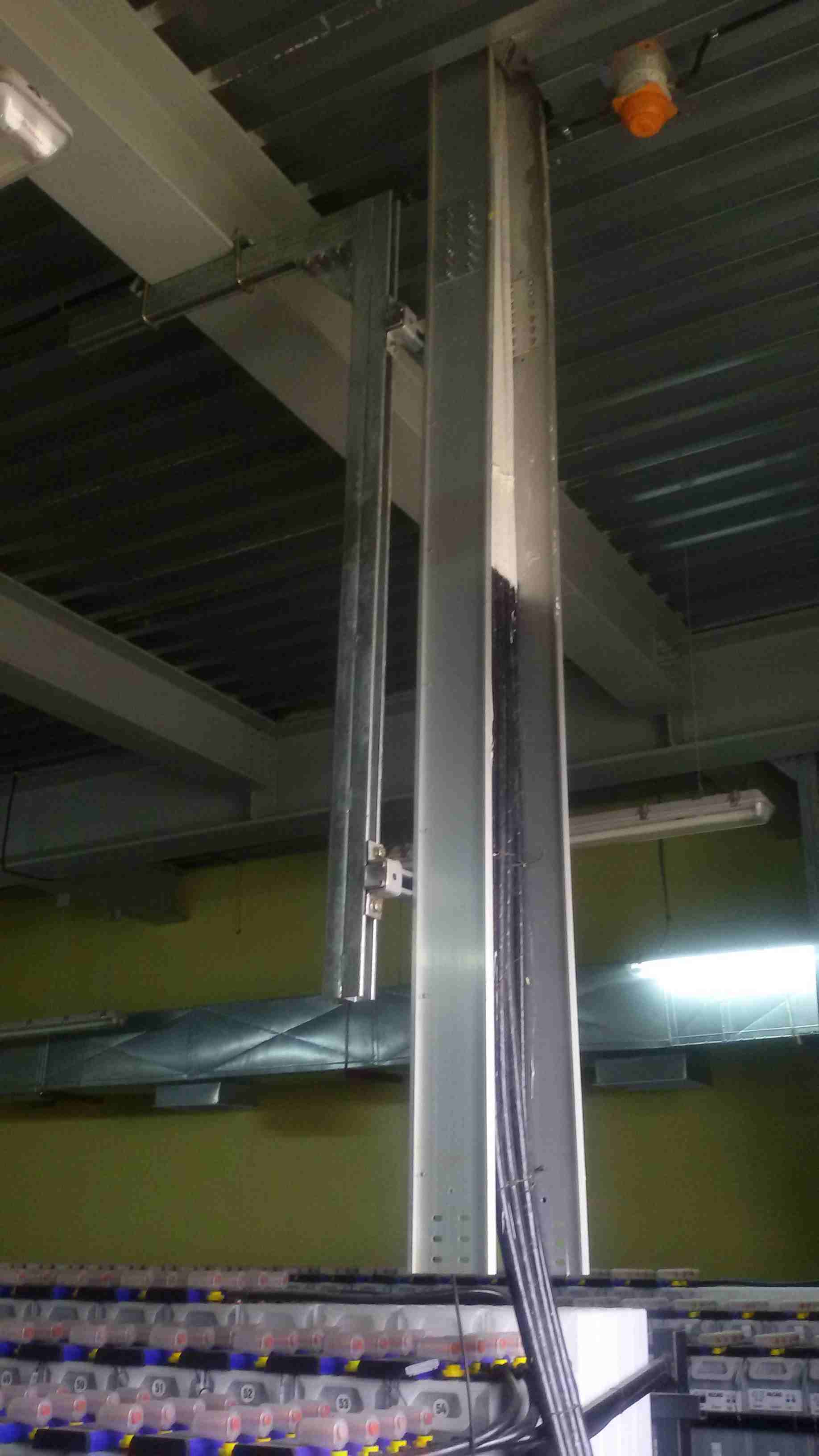 Vertical Cable Tray Installation - Robust vertical cable tray installation demonstrating proper support and securin